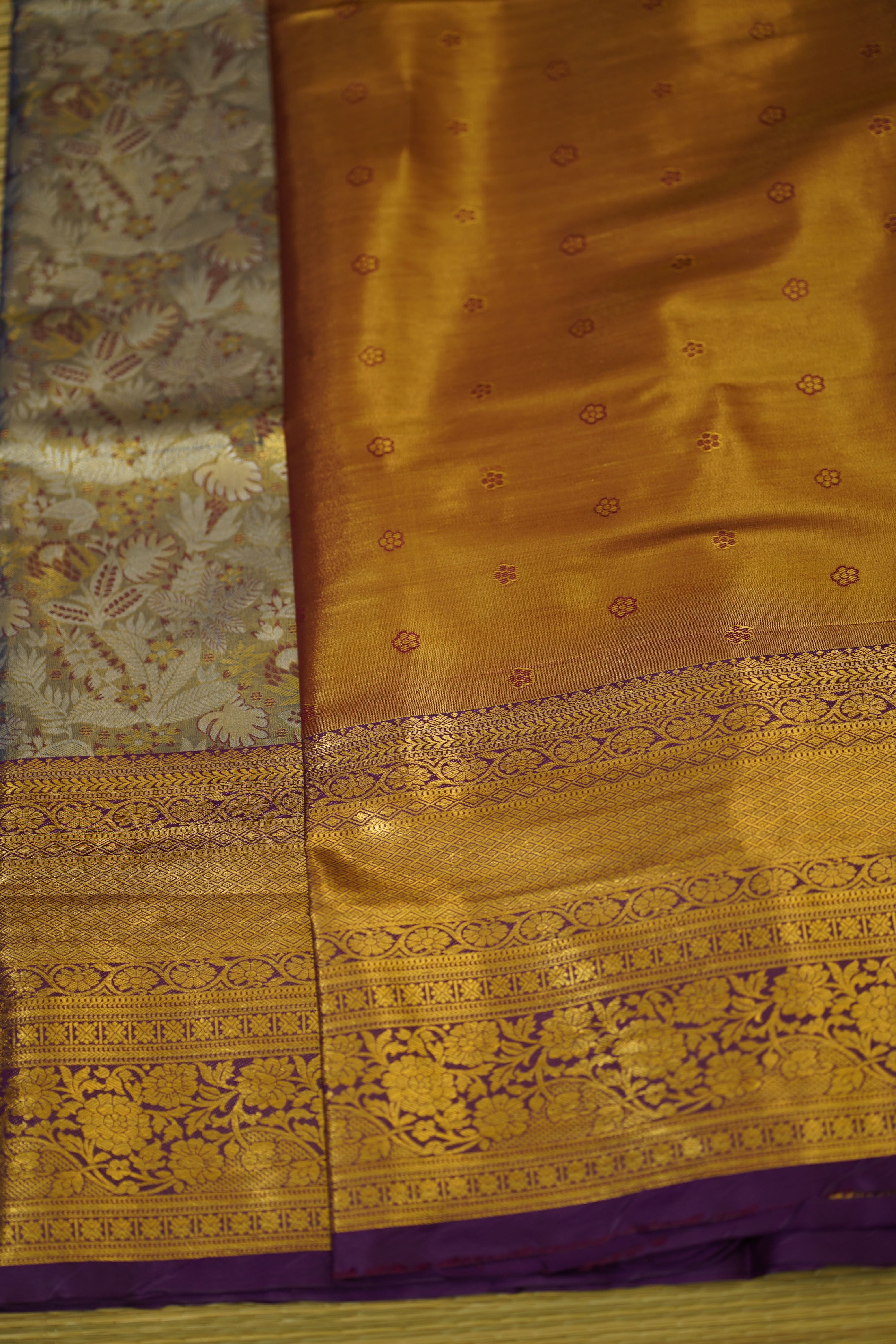 Gold and purple fabric with intricate patterns