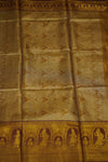 Decorative fabric with intricate patterns in gold and brown